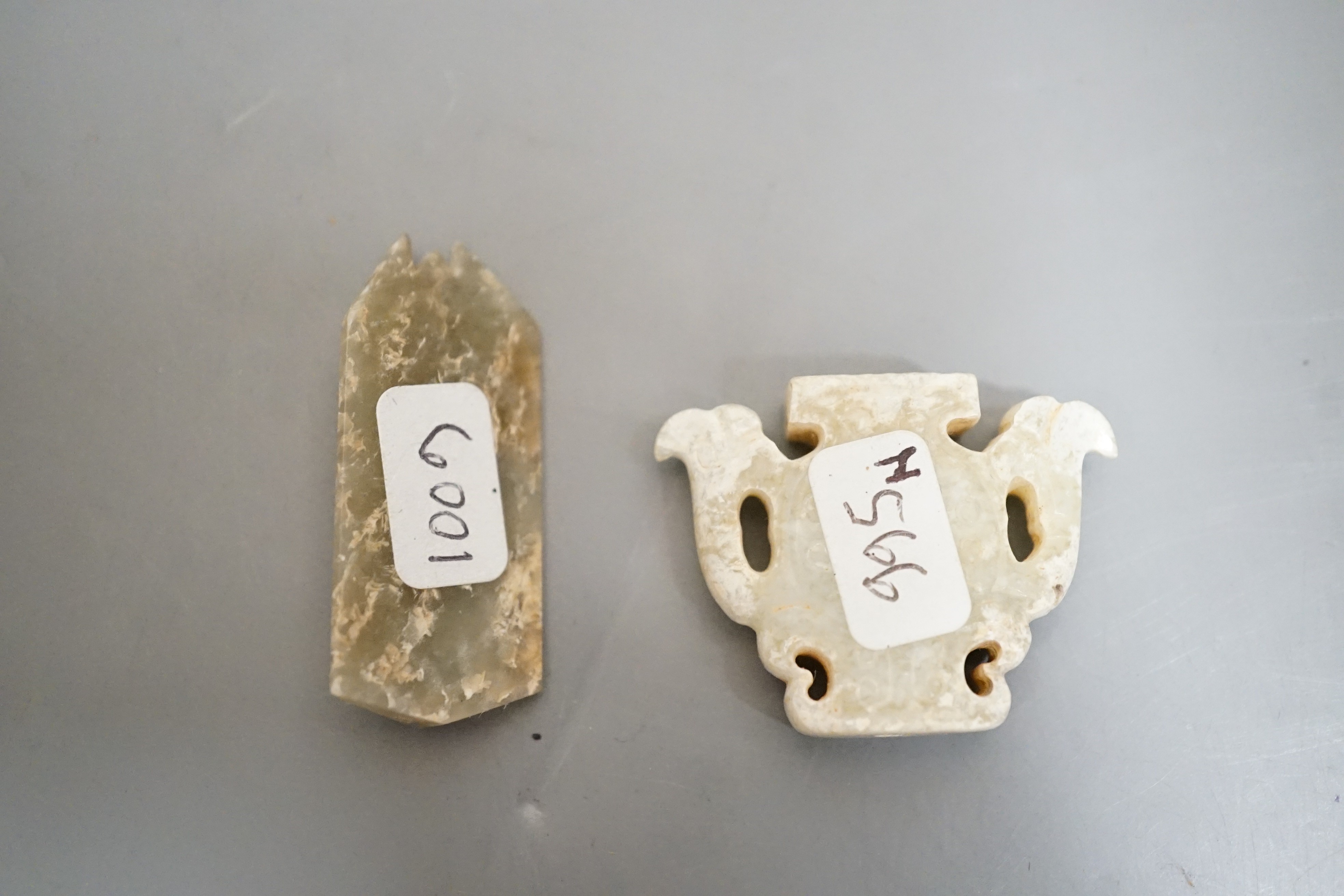 Two Chinese archaic jade carvings - a cicada and finial